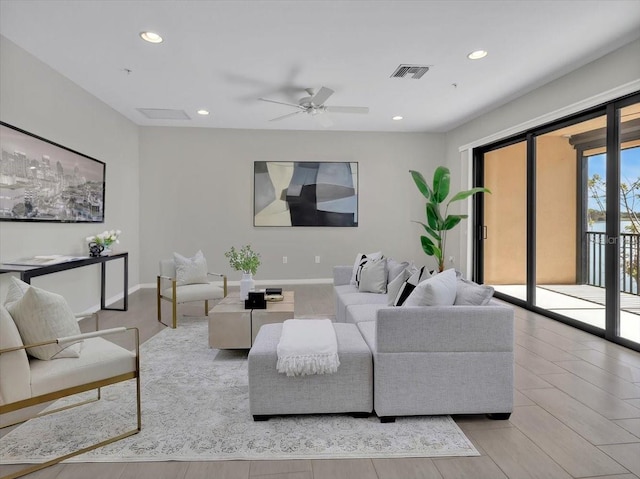 living room featuring ceiling fan