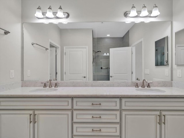 bathroom with vanity and an enclosed shower