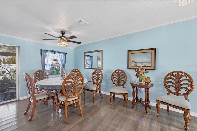 dining space with crown molding, hardwood / wood-style flooring, and ceiling fan