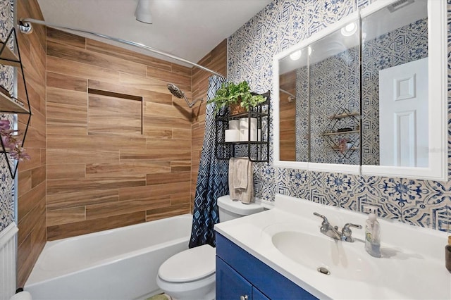 full bathroom with vanity, toilet, and shower / bath combo with shower curtain