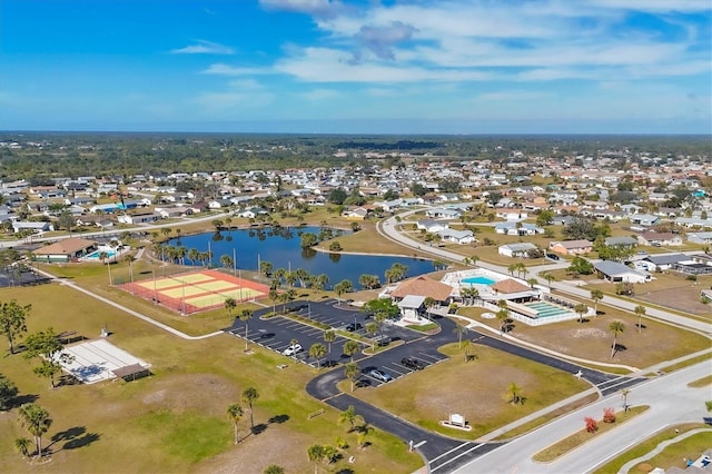 birds eye view of property featuring a water view