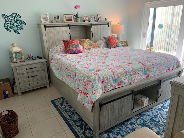 bedroom with light tile patterned floors