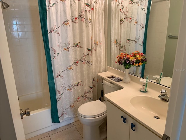 full bathroom with shower / tub combo, vanity, tile patterned floors, and toilet