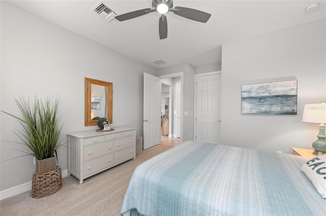 carpeted bedroom featuring ceiling fan