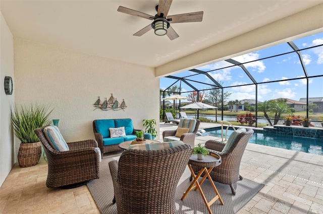 view of patio with a lanai, an outdoor hangout area, and ceiling fan