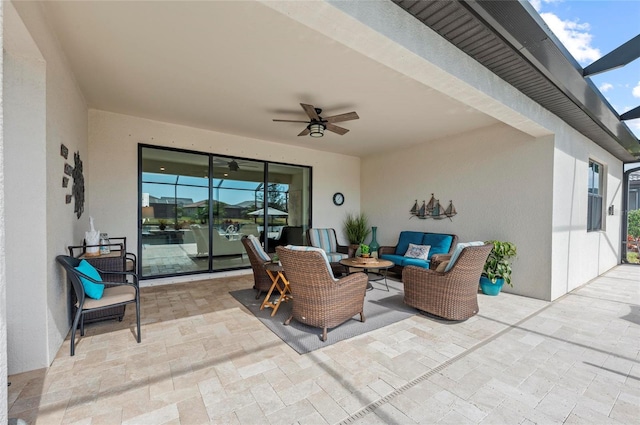 view of patio / terrace featuring an outdoor living space and ceiling fan