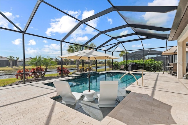 view of swimming pool featuring a patio, glass enclosure, and a jacuzzi