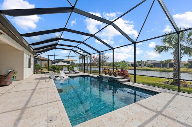 view of swimming pool featuring pool water feature, a patio, a water view, and glass enclosure