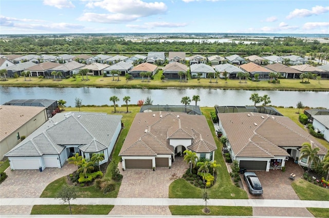 birds eye view of property featuring a water view