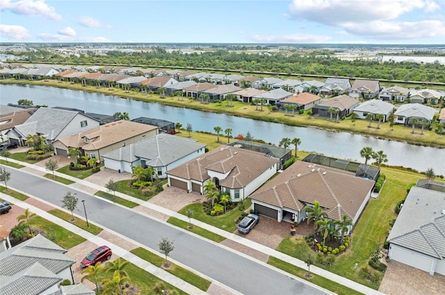 drone / aerial view with a water view