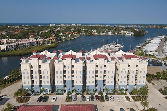 birds eye view of property featuring a water view