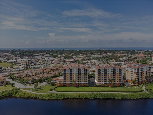 drone / aerial view featuring a water view