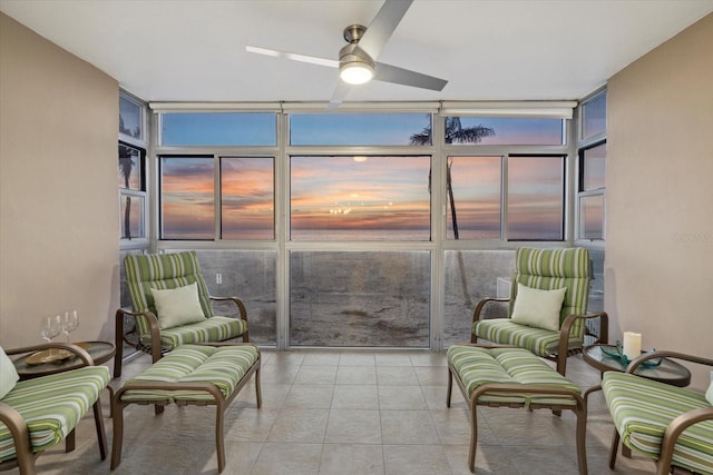 sunroom with ceiling fan