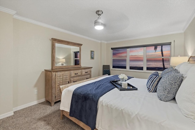 carpeted bedroom with crown molding, ceiling fan, and a textured ceiling