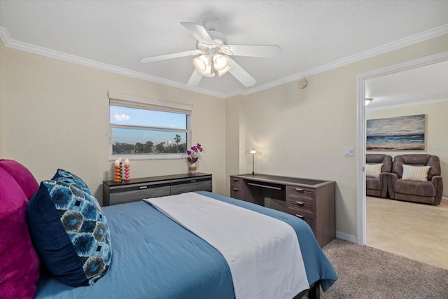 carpeted bedroom with crown molding and ceiling fan