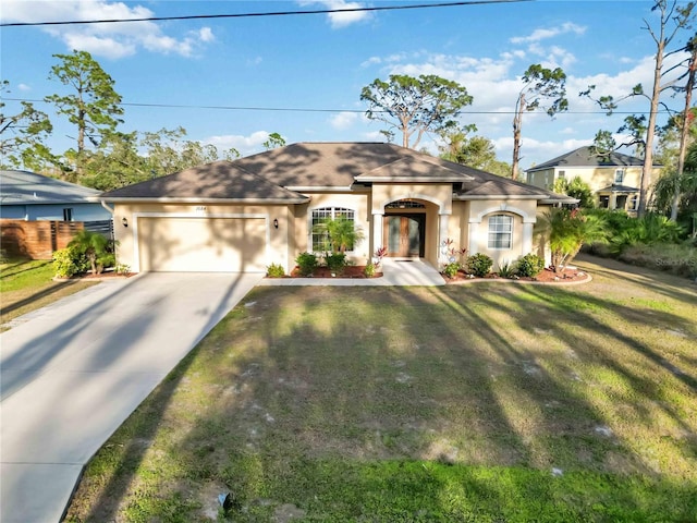 ranch-style house with a garage and a front lawn