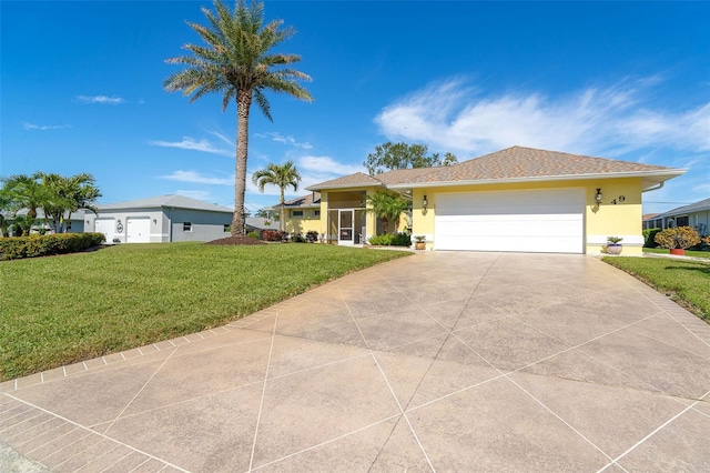 ranch-style house with a garage and a front lawn