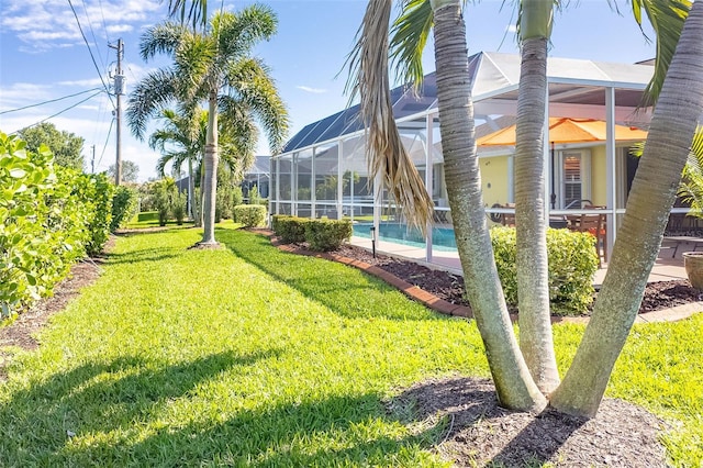 view of yard with a lanai