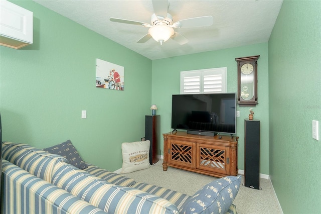 living room featuring light colored carpet and ceiling fan