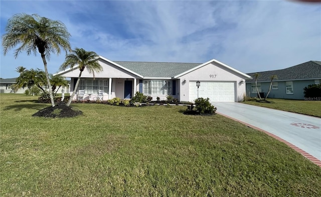 ranch-style home featuring a garage and a front lawn