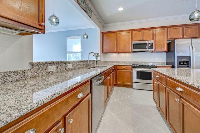 kitchen featuring light tile patterned flooring, appliances with stainless steel finishes, sink, hanging light fixtures, and crown molding