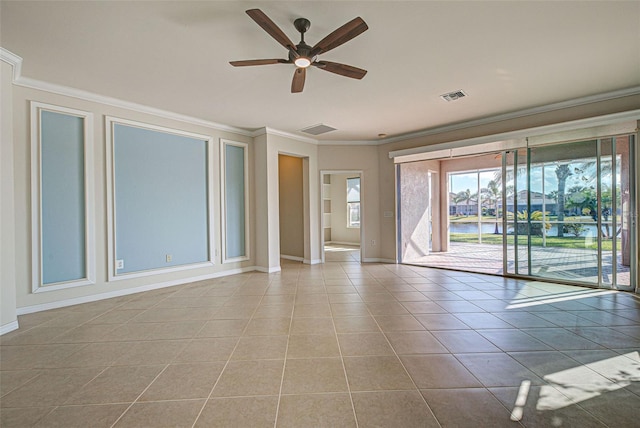 tiled spare room with crown molding and ceiling fan