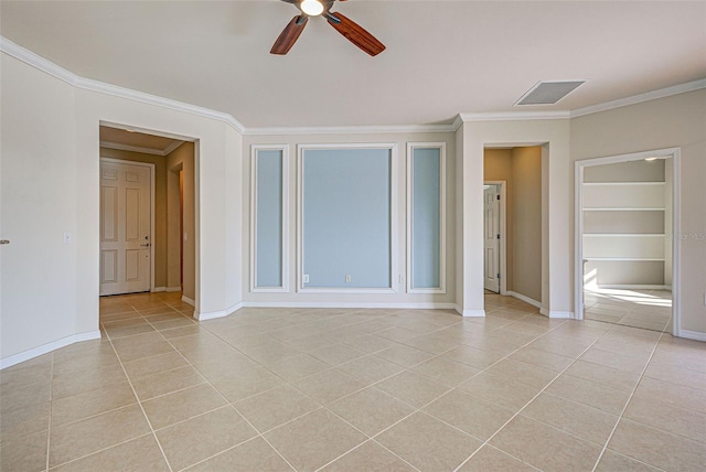 unfurnished room featuring light tile patterned flooring, ceiling fan, crown molding, and built in shelves