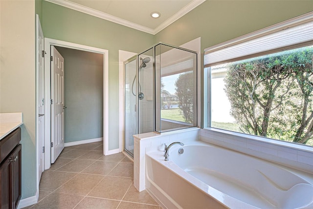 bathroom featuring vanity, ornamental molding, tile patterned floors, and plus walk in shower