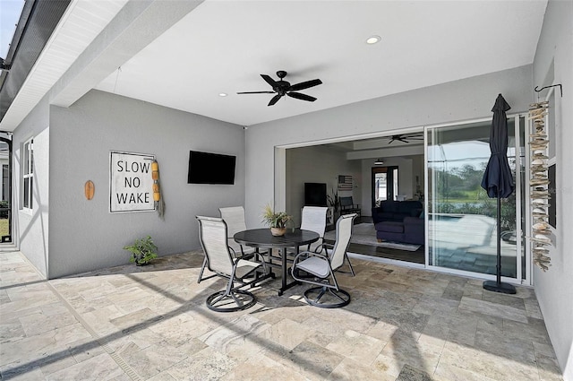 view of patio with ceiling fan