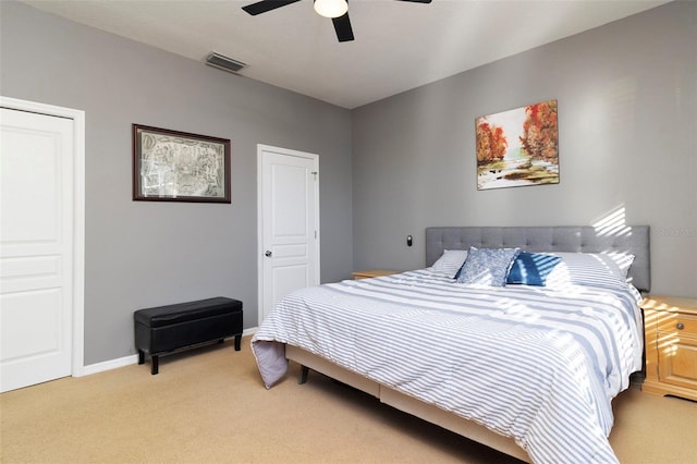 carpeted bedroom featuring ceiling fan