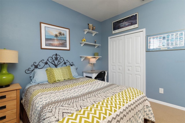 bedroom with a closet and carpet