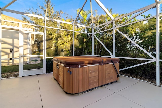 unfurnished sunroom with a jacuzzi