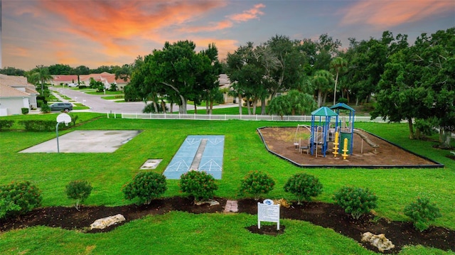 playground at dusk with a yard