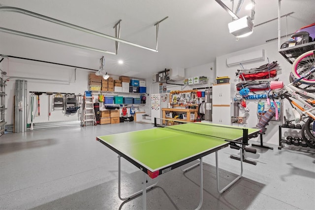 recreation room with an AC wall unit