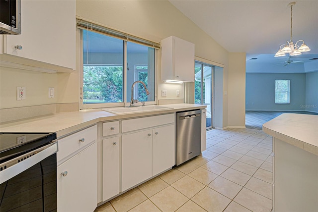 kitchen with pendant lighting, white cabinetry, stainless steel appliances, and sink