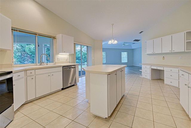 kitchen featuring hanging light fixtures, a kitchen island, white cabinets, and stainless steel appliances