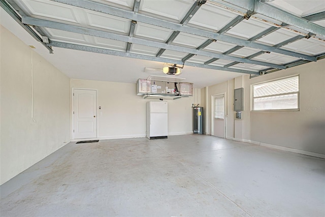 garage with white refrigerator, a garage door opener, electric panel, and water heater