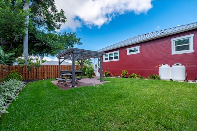 view of yard with a pergola and a patio