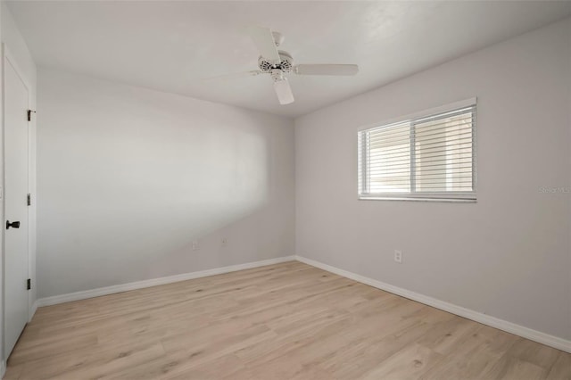 unfurnished room with ceiling fan and light hardwood / wood-style flooring