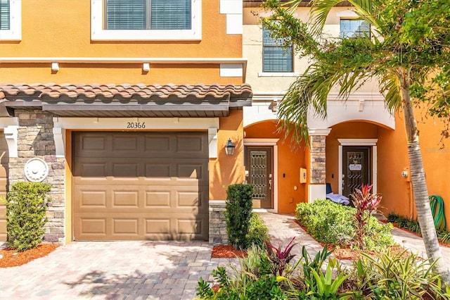 view of front of property featuring a garage