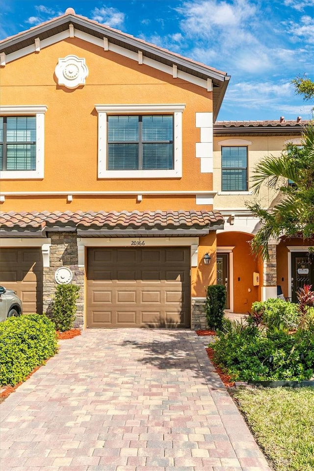 view of front of home with a garage