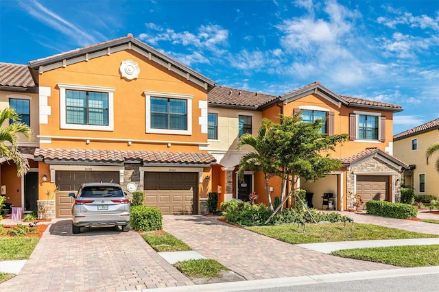 view of front of property with a garage