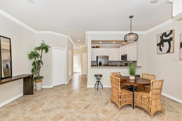 dining area with crown molding