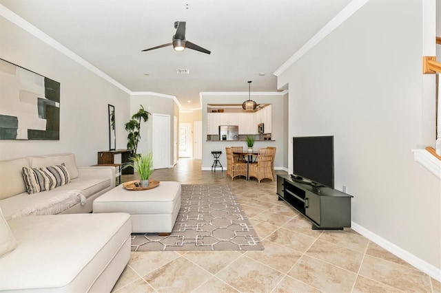 tiled living room featuring crown molding and ceiling fan