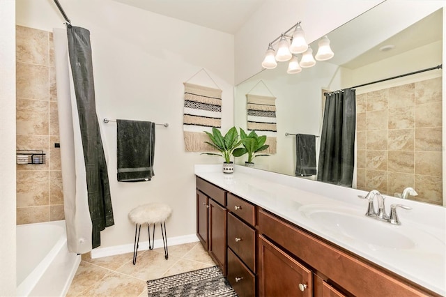 bathroom featuring vanity, tile patterned flooring, and shower / bath combo with shower curtain