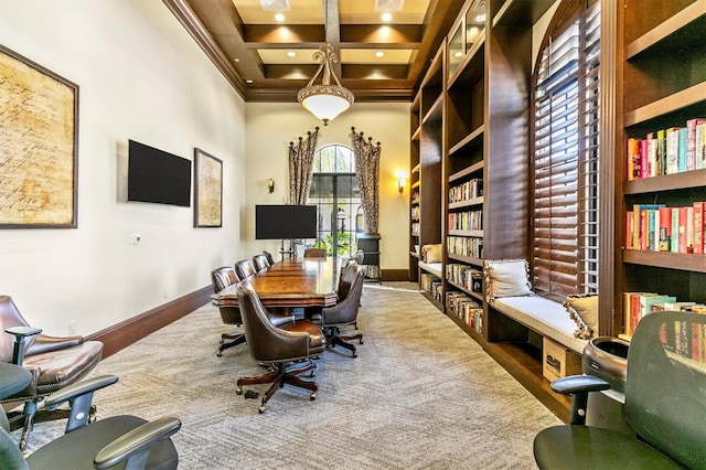 carpeted home office featuring a towering ceiling, plenty of natural light, coffered ceiling, and beam ceiling