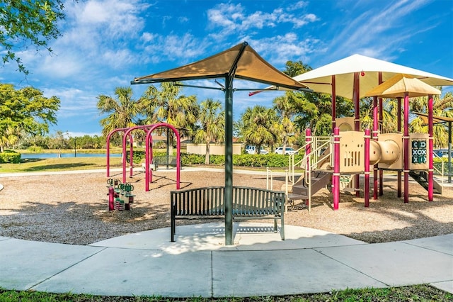 view of jungle gym with a water view