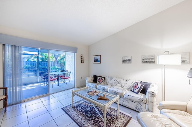 tiled living room featuring lofted ceiling