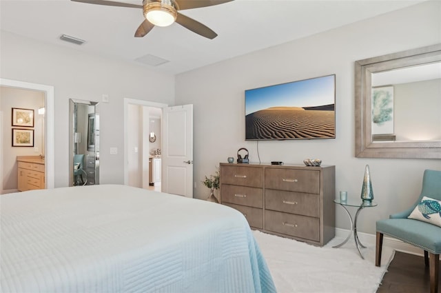 bedroom with ceiling fan and ensuite bathroom