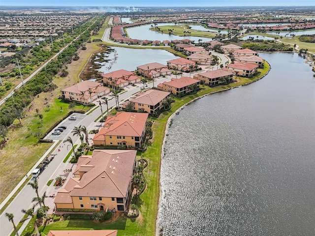 drone / aerial view with a water view